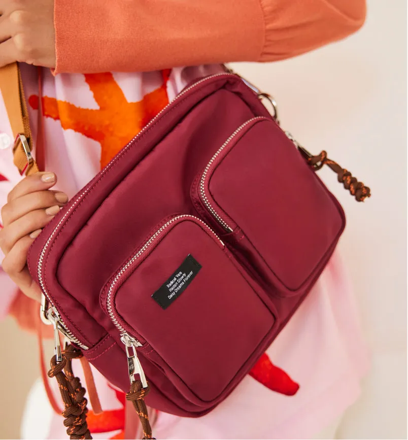 The Messenger Recycled Nylon Pocket Bag | Rusty Magenta